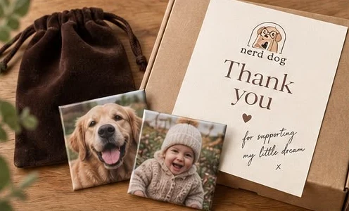 Photo magnets of a dog and a baby with a velvet gift bag and a nerd dog thank you card